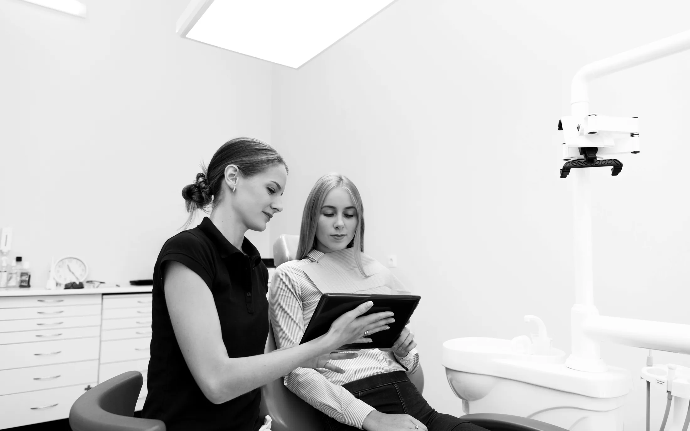 Black-and-white patient administration tablet workspace